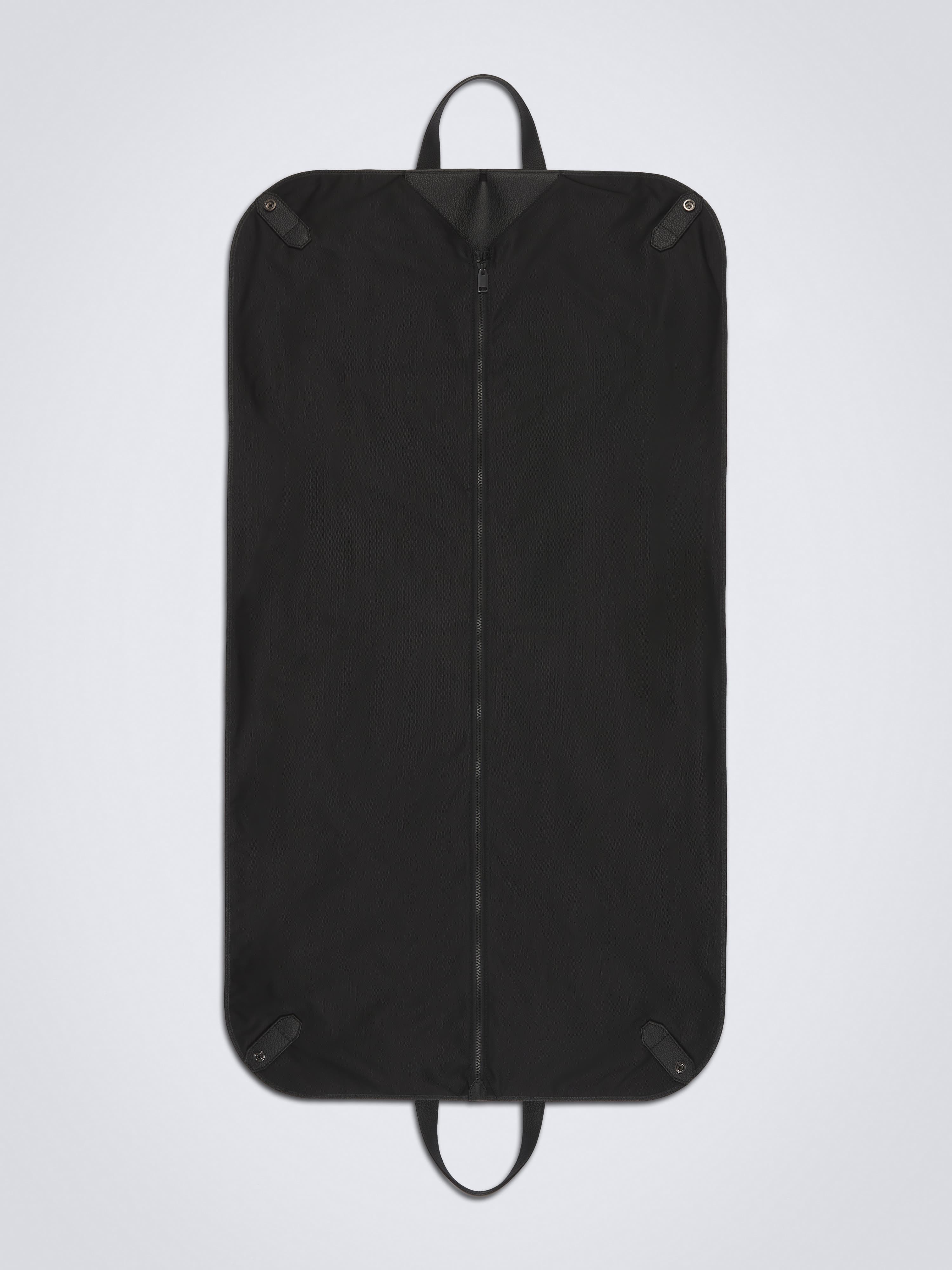 suit dress bag Nomatic The spacious main compartment securely holds up to two suits or three dresses Luxury Garment Bag - Clothing